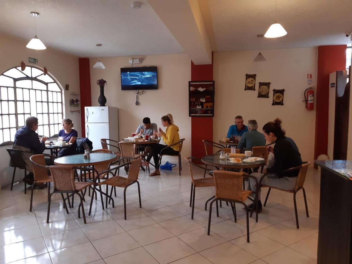 Hostal Amazonia y sol Baños Kültér fotó